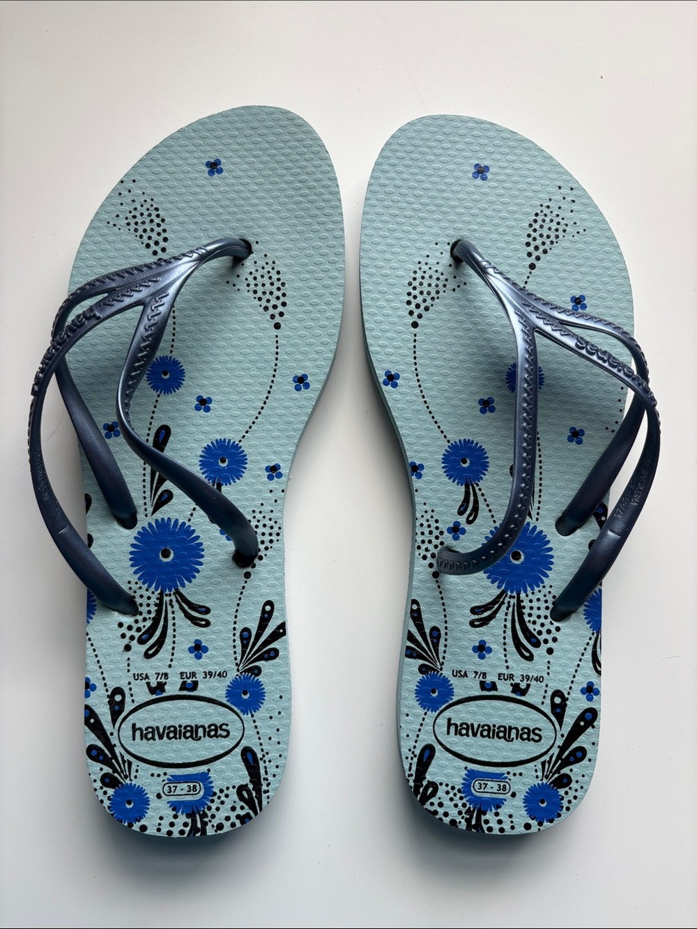 Havaianas Light Teal Floral Flip Flops with Metallic Blue Straps